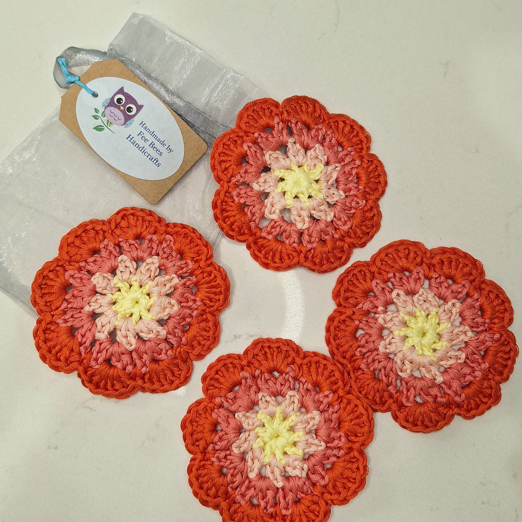 crochet drink coasters in a set of four - Ombre style
