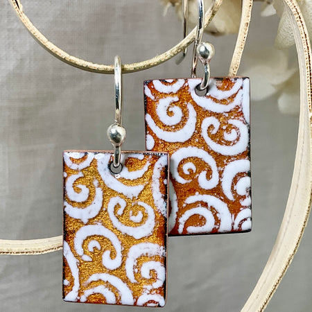 Golden and white pattern earrings. Enamel. Handmade