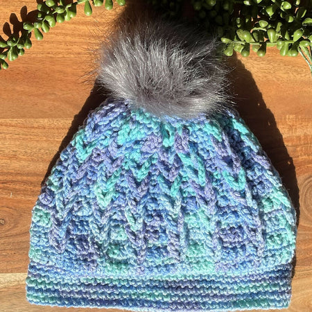 Ladies beanie with faux removable pompom