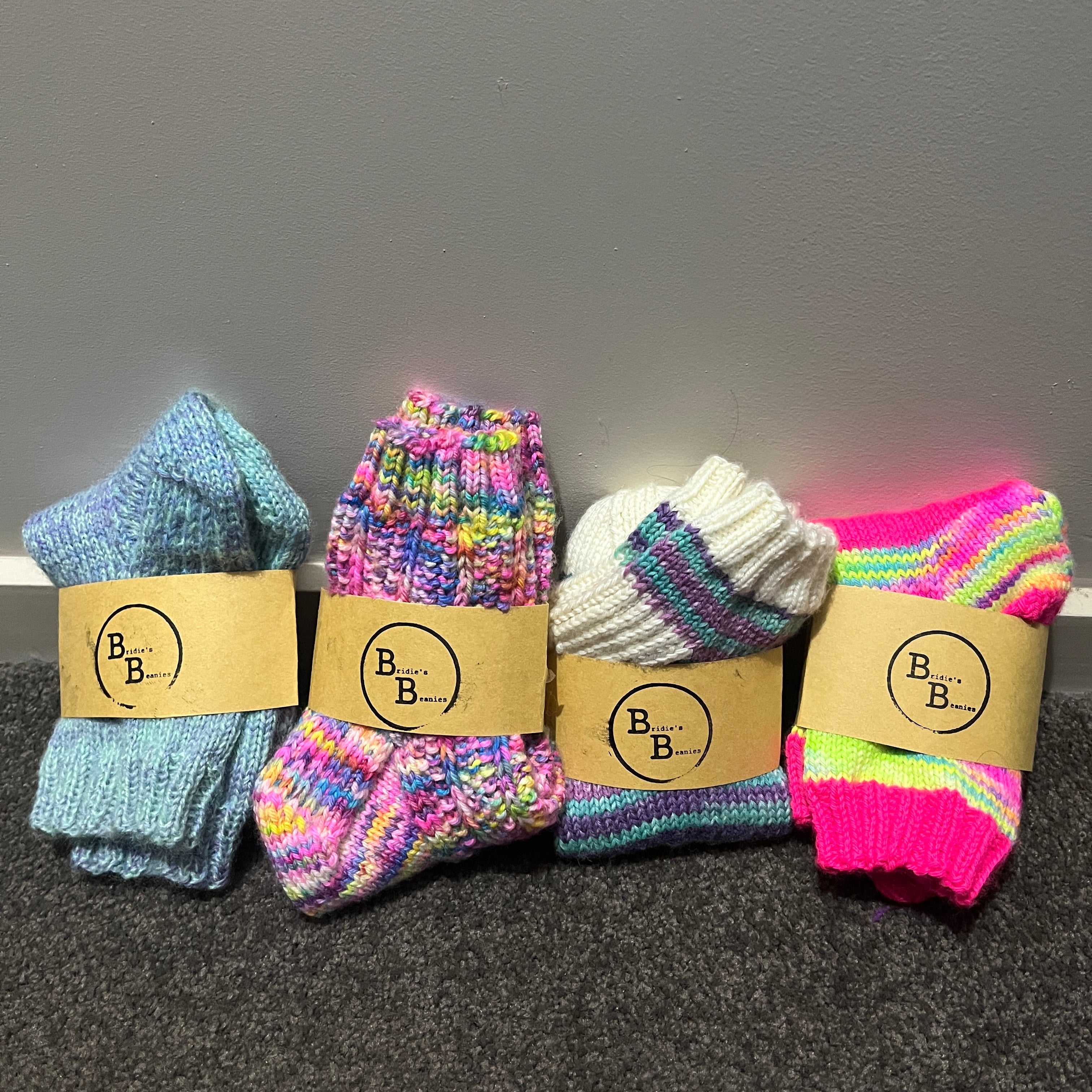Hand knit rainbow socks using Australian Hand dyed yarn