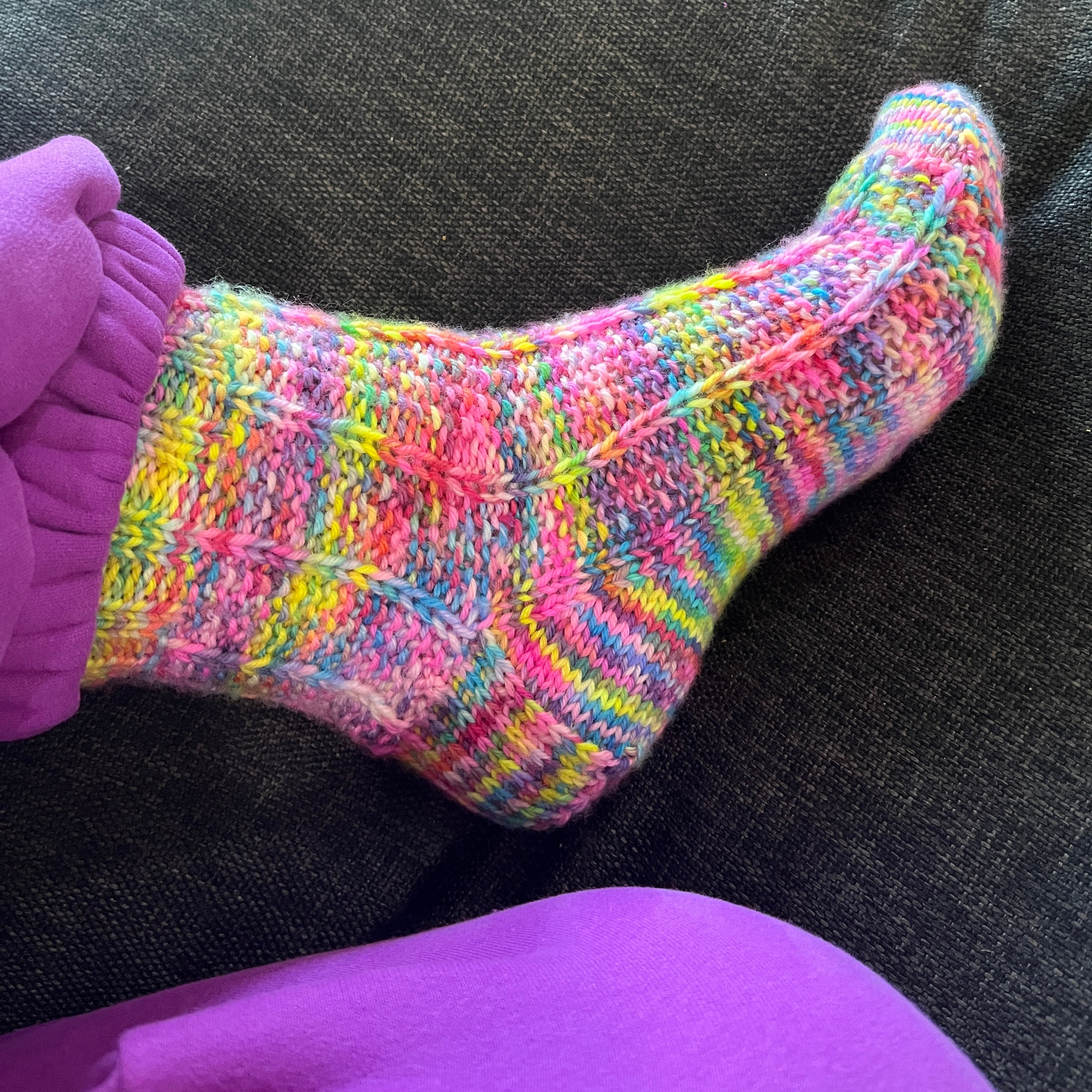 Hand knit rainbow socks using Australian Hand dyed yarn
