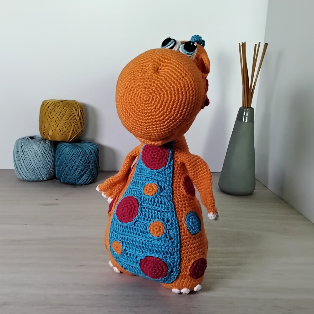 Orange-dinosaur-slightly-front-view-Australian-made-watch-the-birdy-crochet