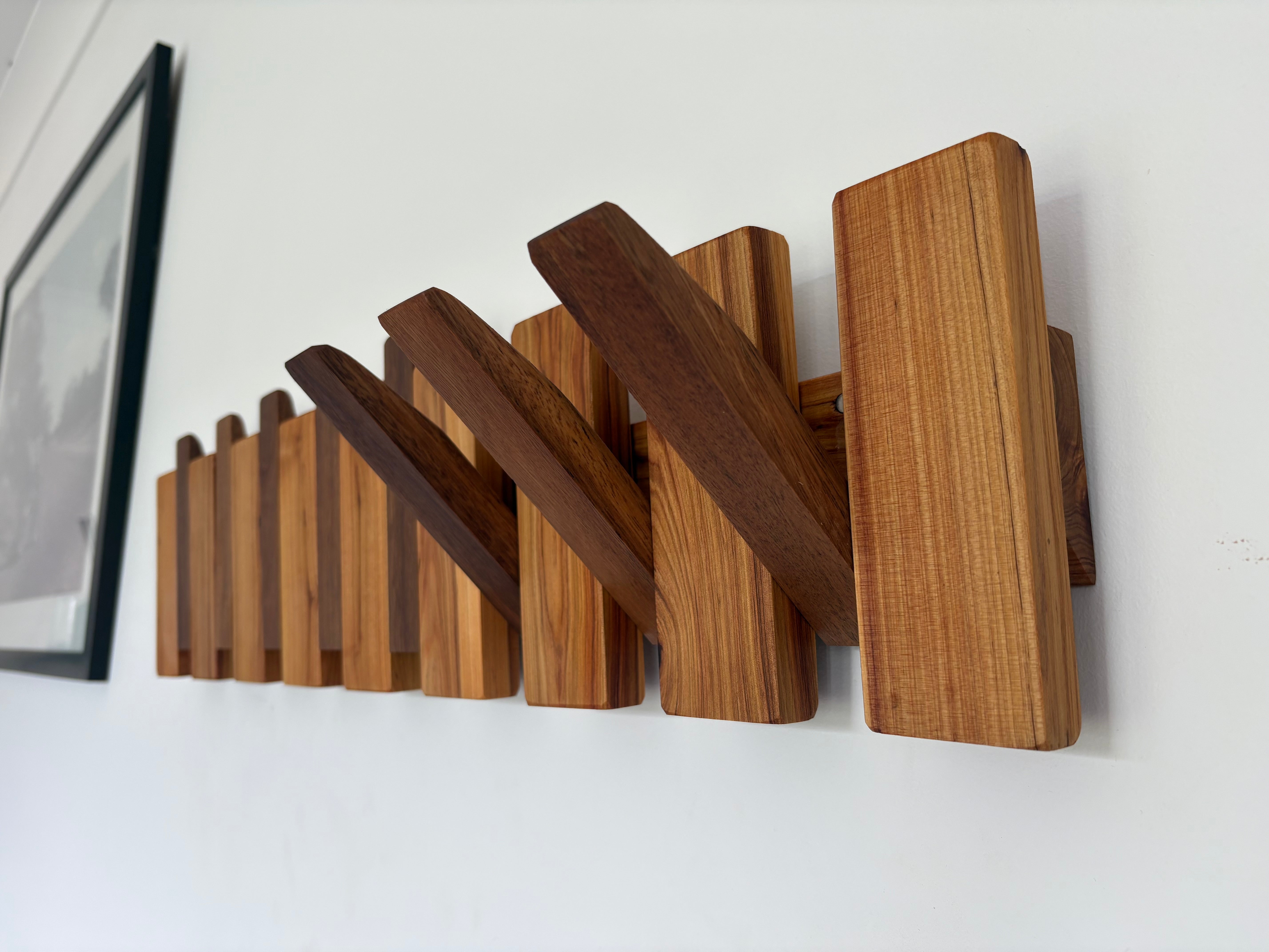 Two tone piano style coatrack