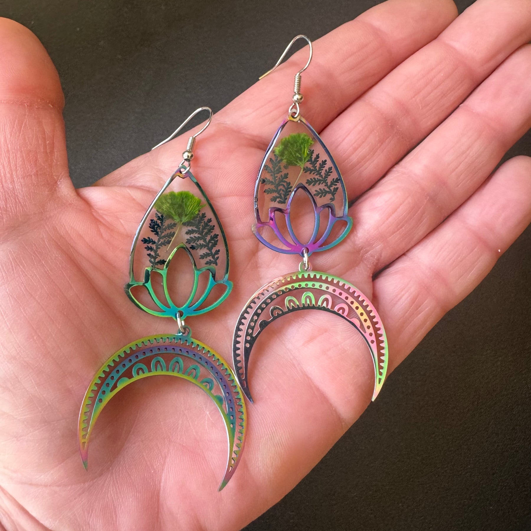 Iridescent rainbow resin earrings with pressed flowers