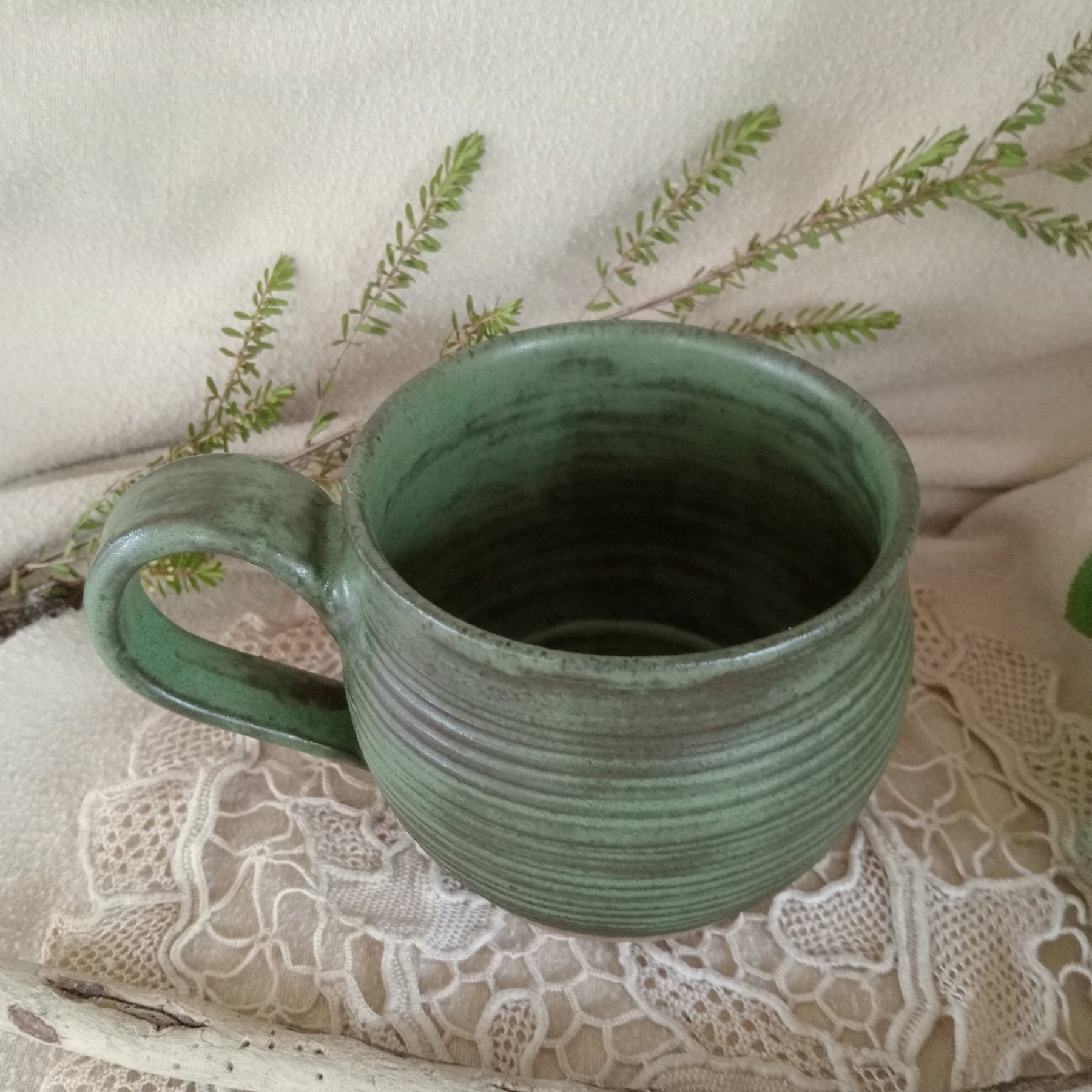 Gumleaf green mug with spiral carved surface