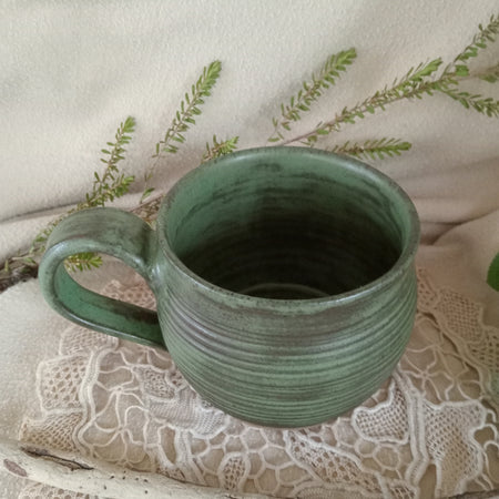 Gumleaf green mug with spiral carved surface