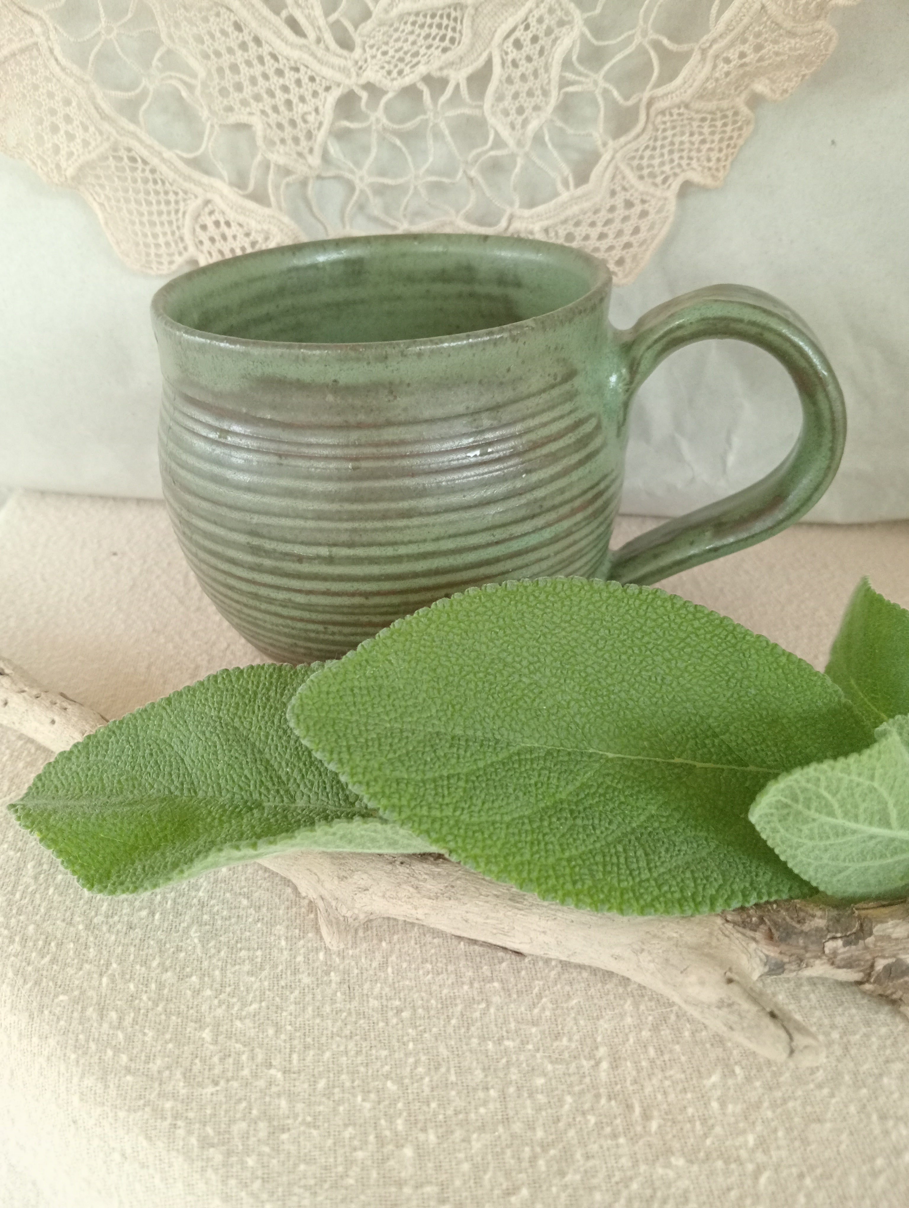 Gumleaf green mug with spiral carved surface