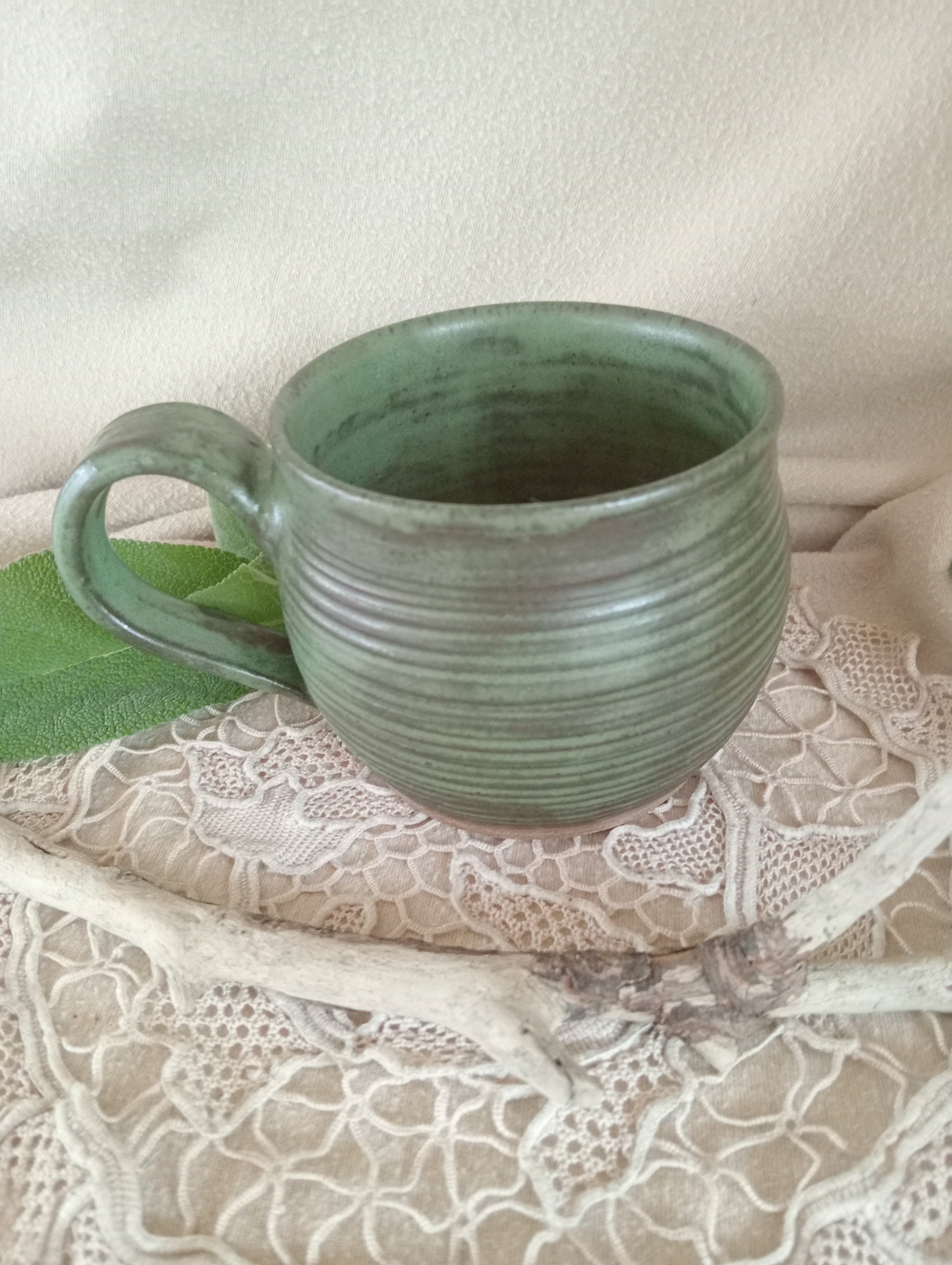 Gumleaf green mug with spiral carved surface