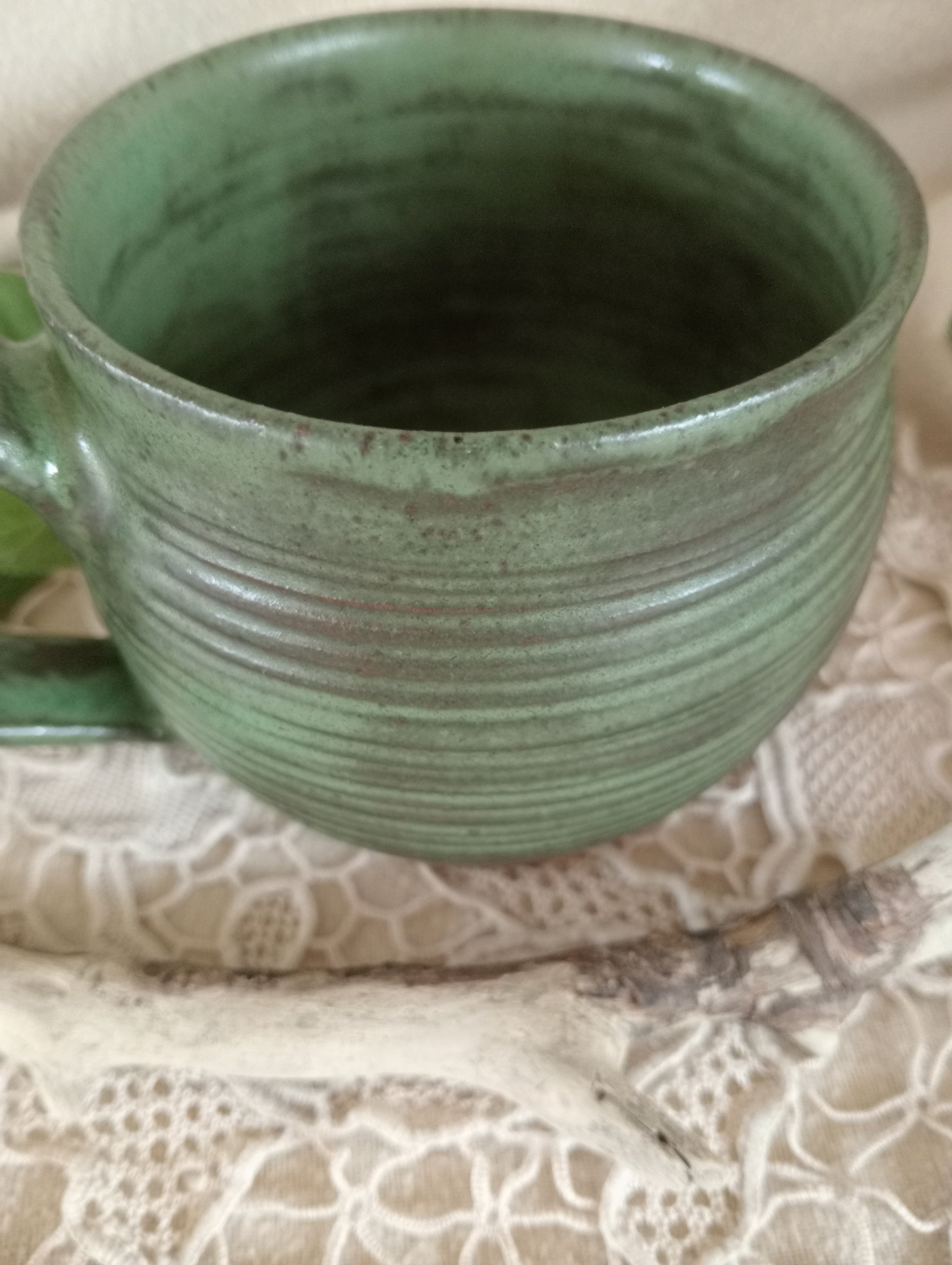 Gumleaf green mug with spiral carved surface