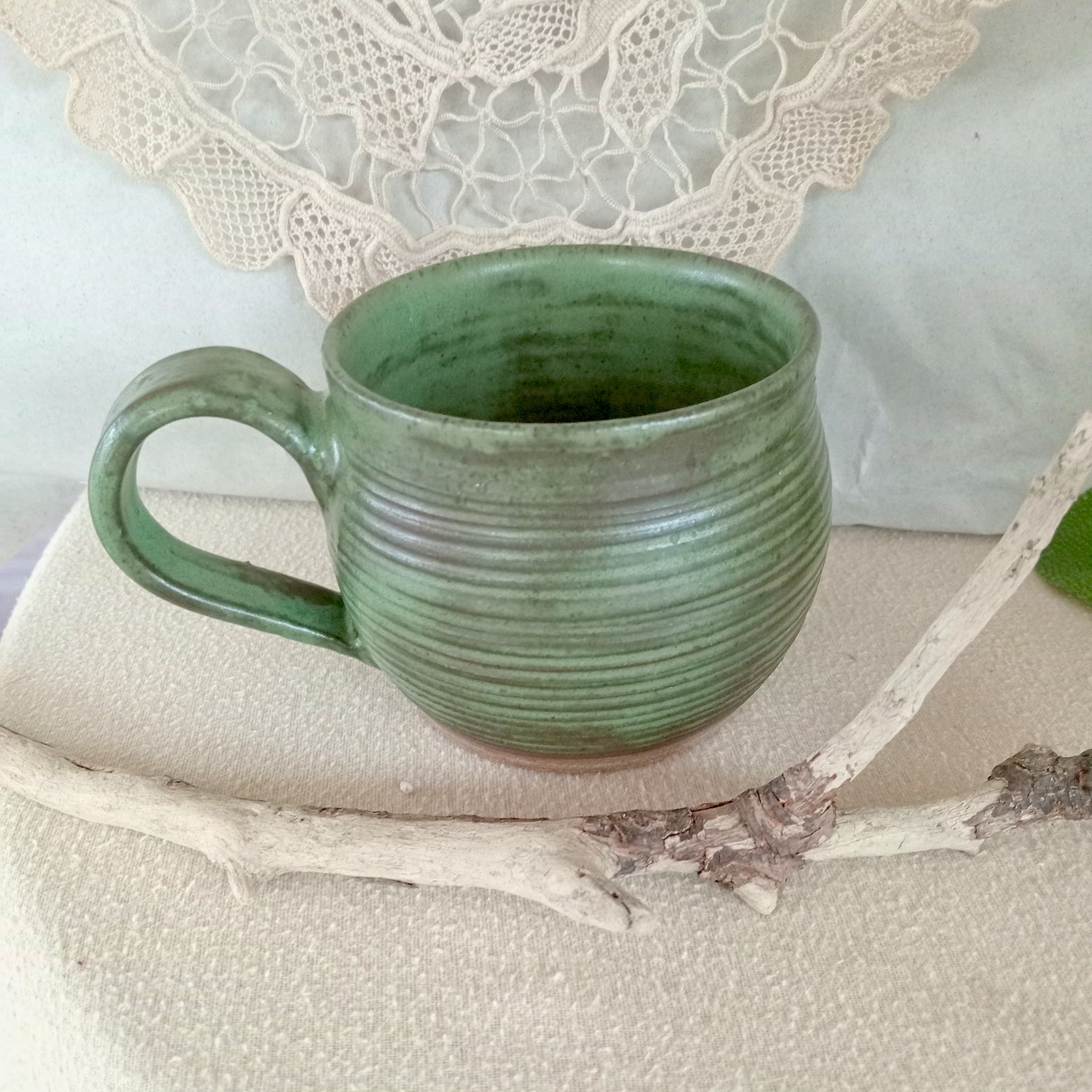 Gumleaf green mug with spiral carved surface