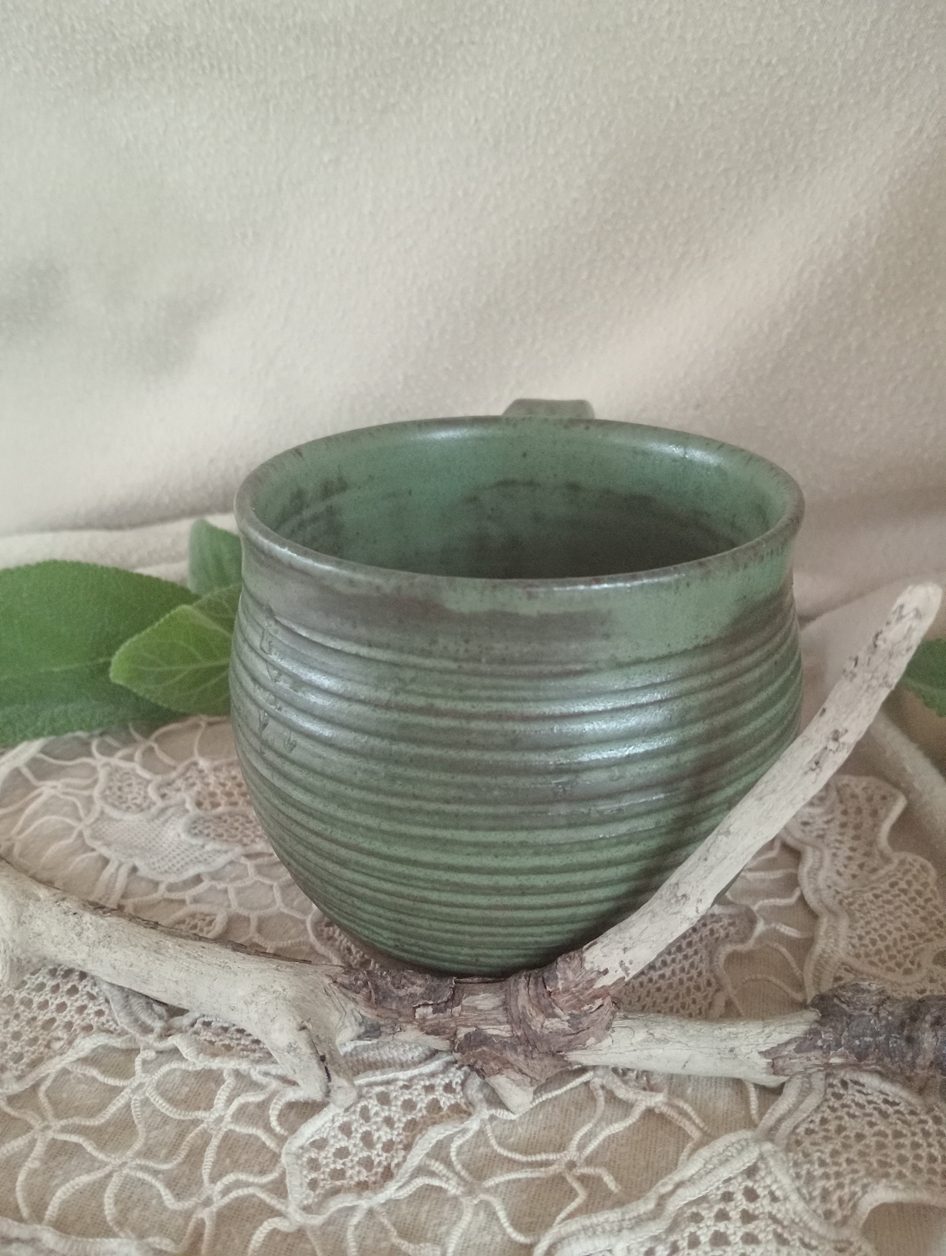 Gumleaf green mug with spiral carved surface