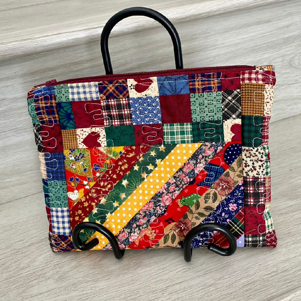 Strip pieced patchwork purse with borders