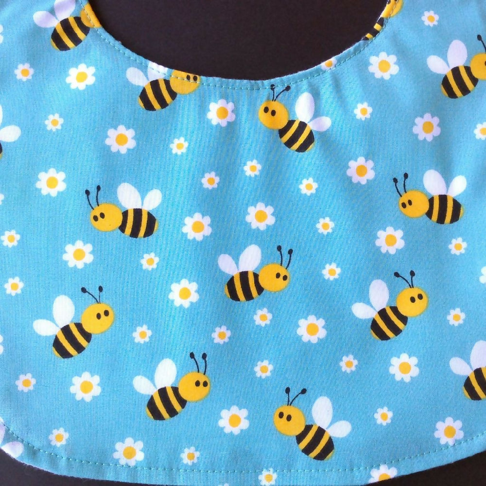 Set of three baby bibs, daisy and bee design.