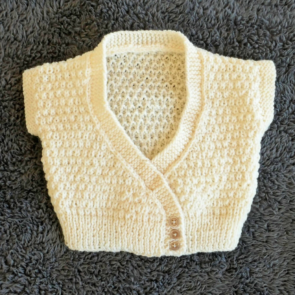 Textured hand knit. Sleeveless jumper, Size 0. Wool.