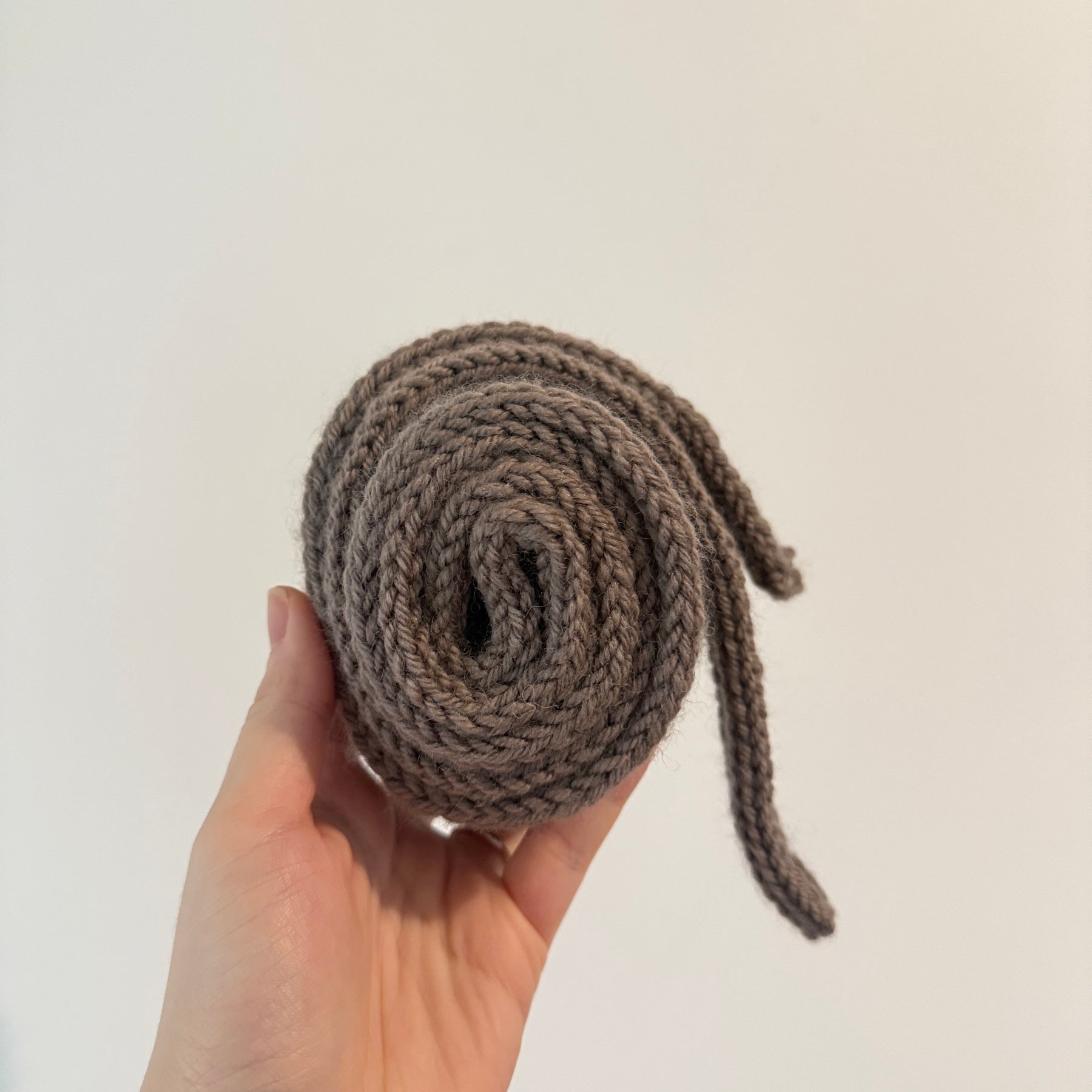 Knitted sophie scarf in dark camel brown