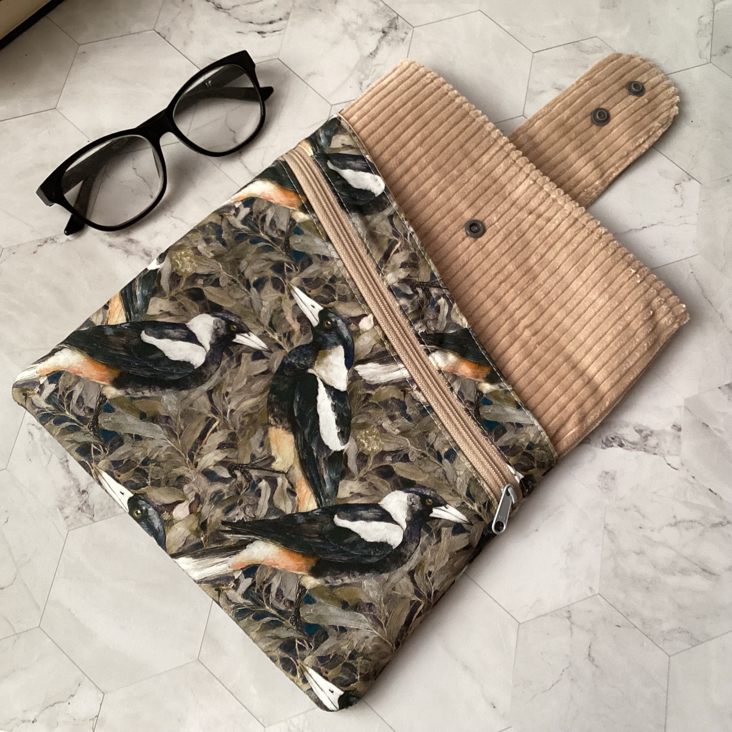 Australian magpies book sleeve with 2 pockets. iPad, tablet pouch