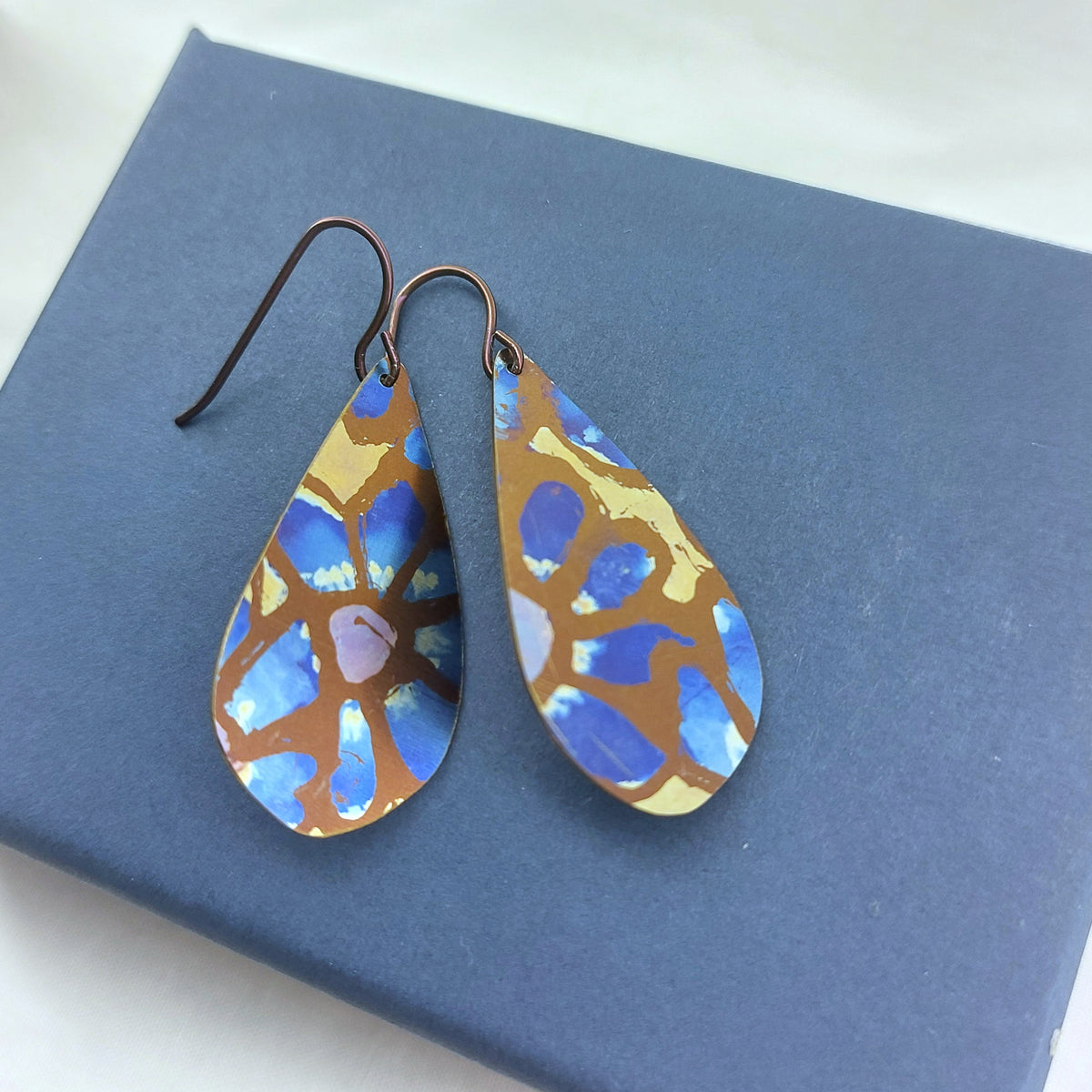 Titanium Teardrop Earrings Painted Flower Design- Gold, Blue and Bronze