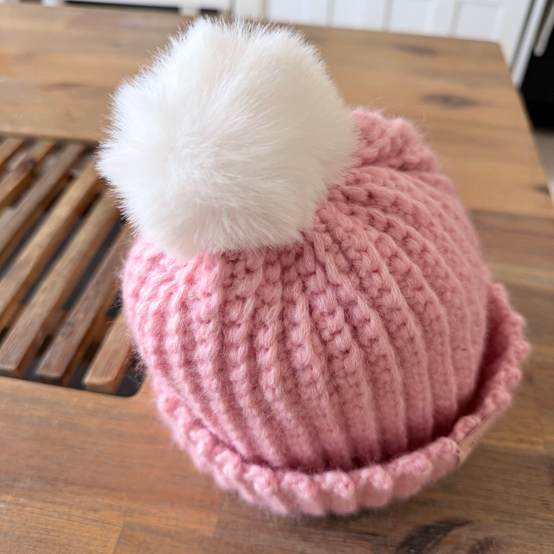 #124  Baby's Beanie with faux fur bobble