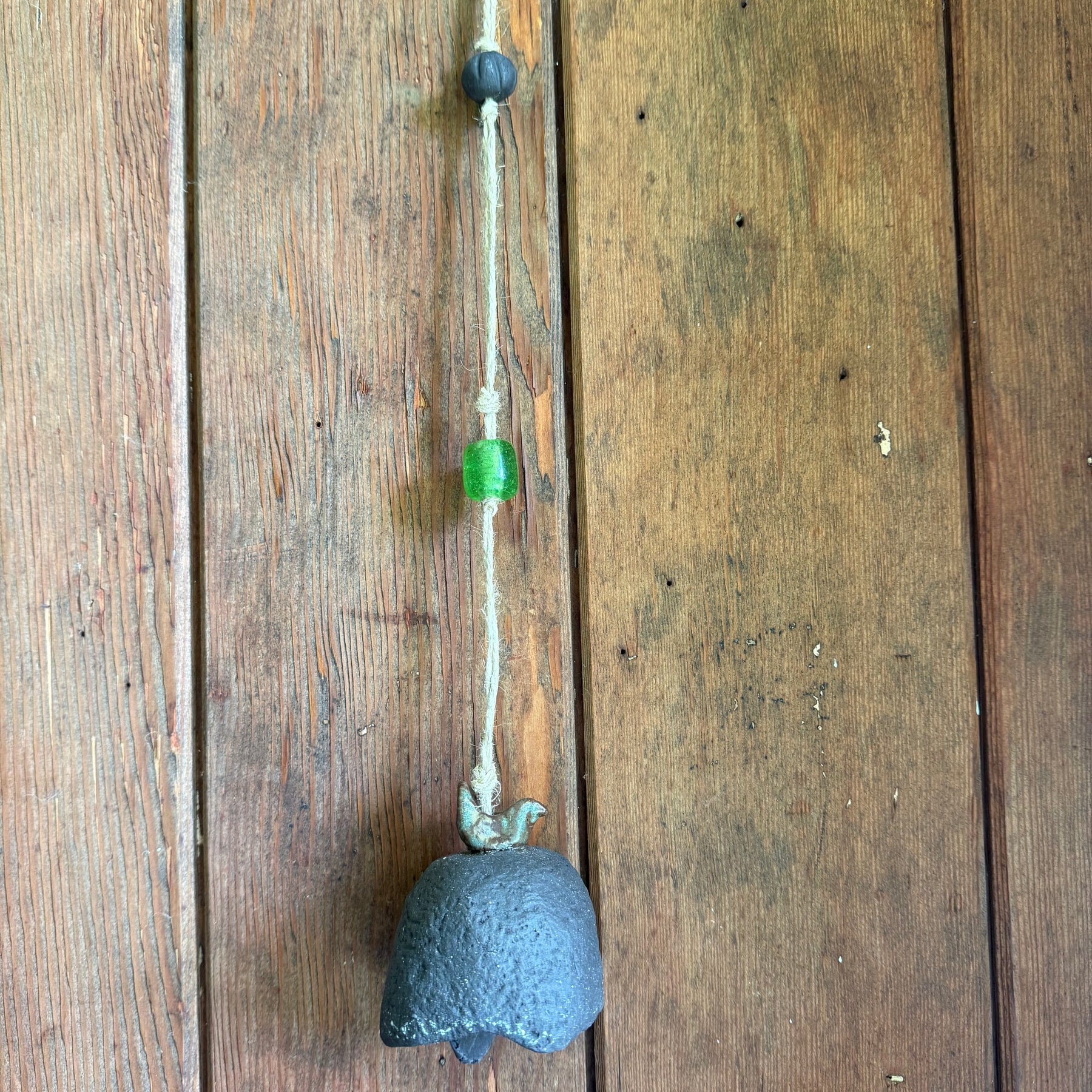 Rustic bell with bird