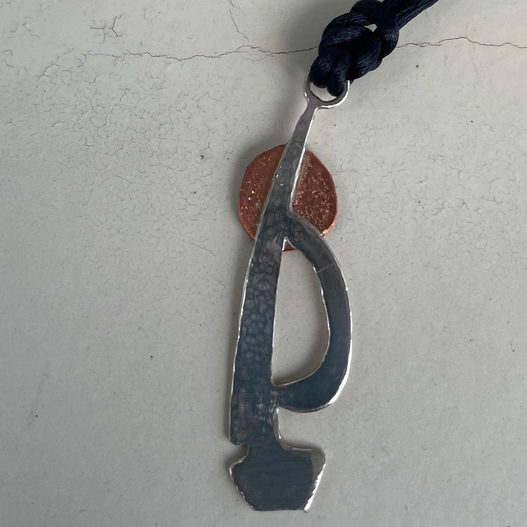 Silver and copper sailing boat into the blood moon