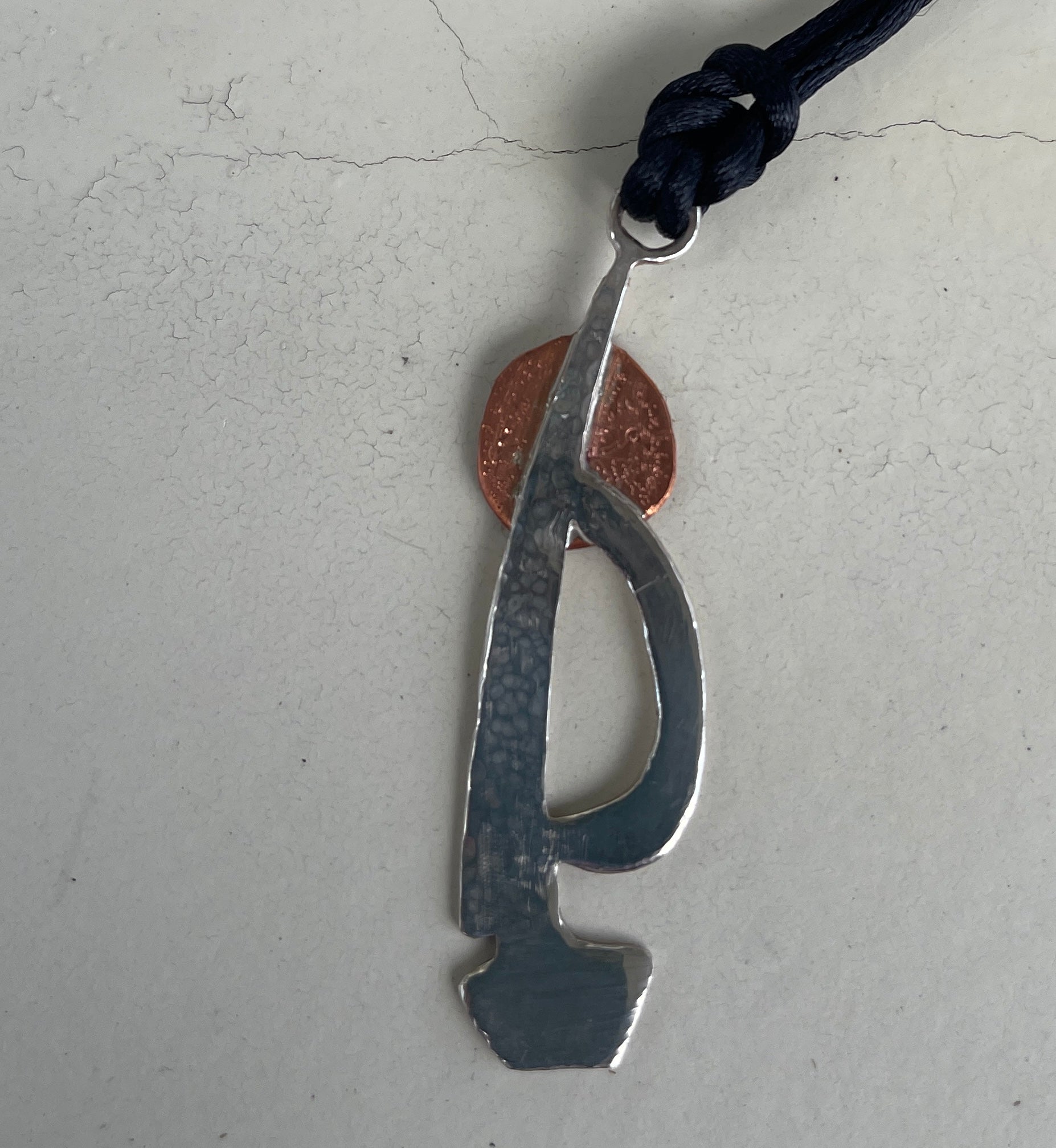 Silver and copper sailing boat into the blood moon