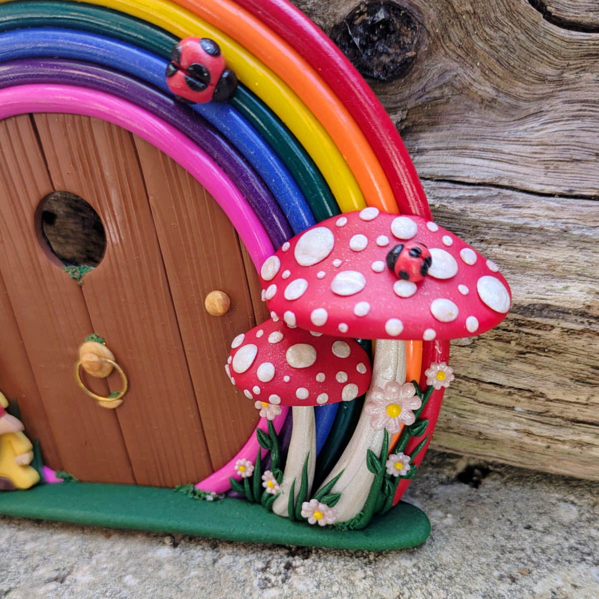 Rainbow Fairy Door with Gnome Visitor
