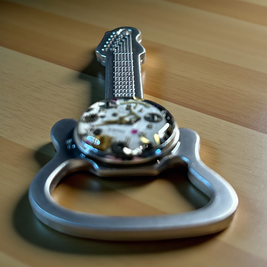 Steampunk watch parts guitar bottle opener