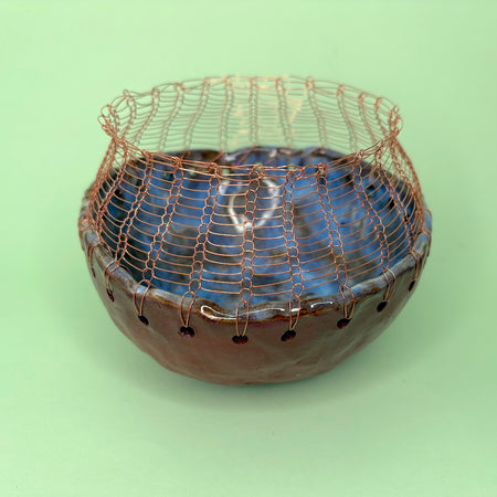Ceramic bowl with knitted wire