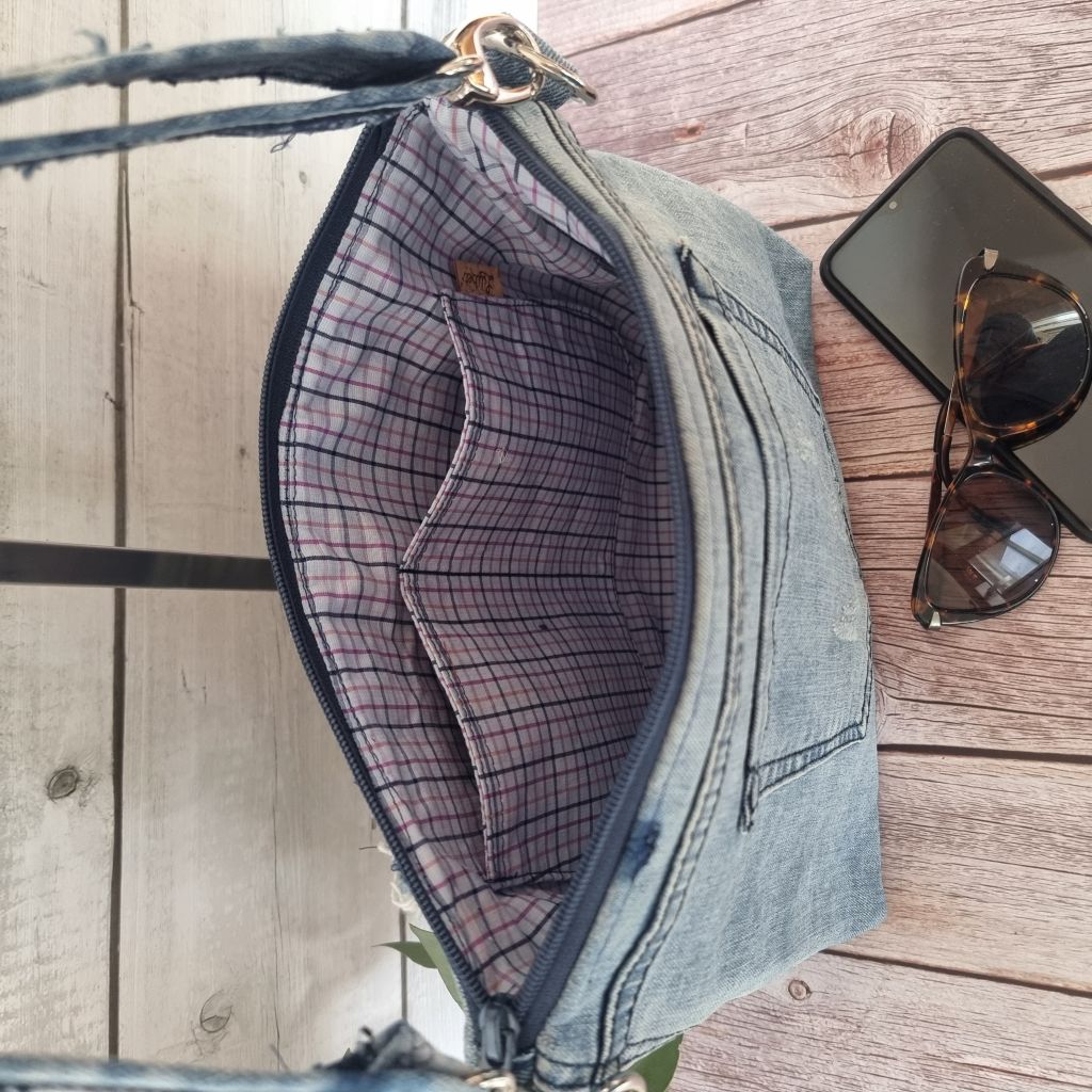 Handmade upcycled angle patched denim zip crossbody bag