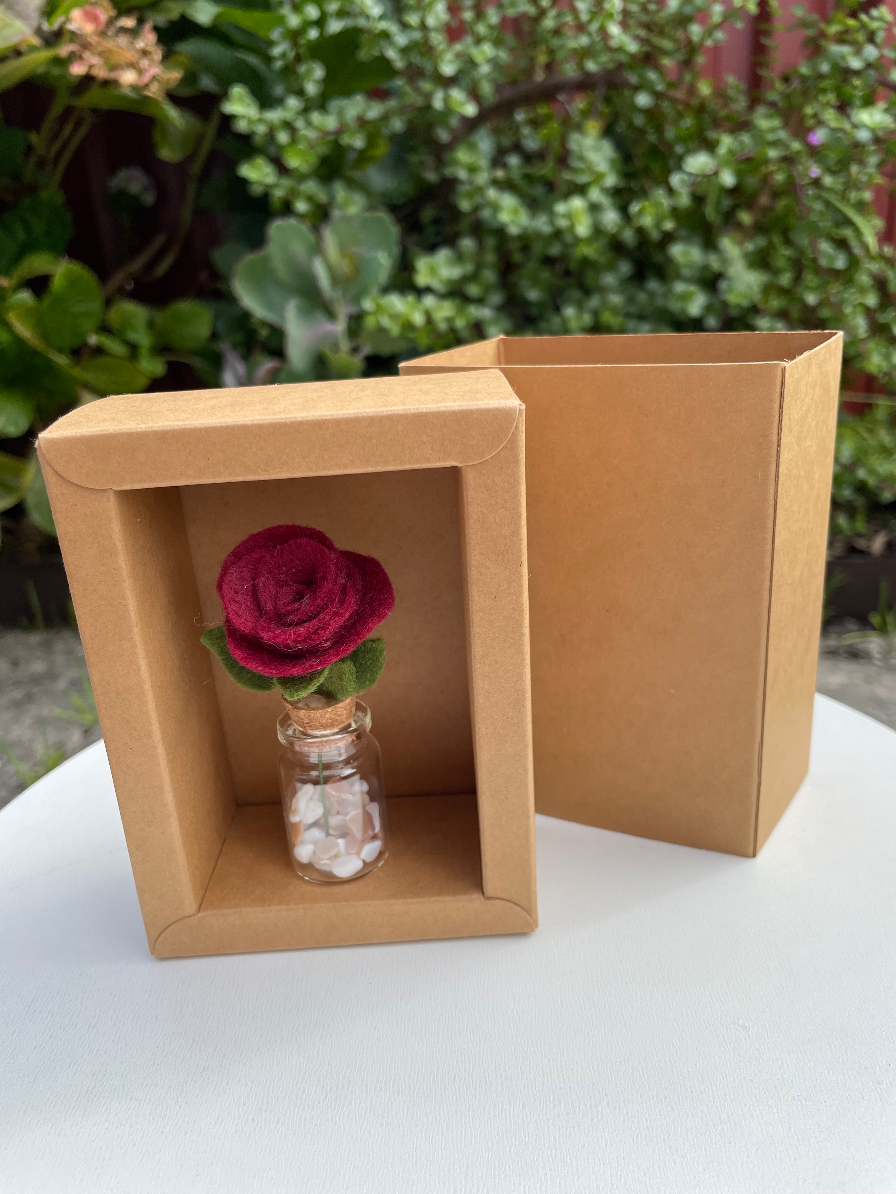 Minature flower in glass jar