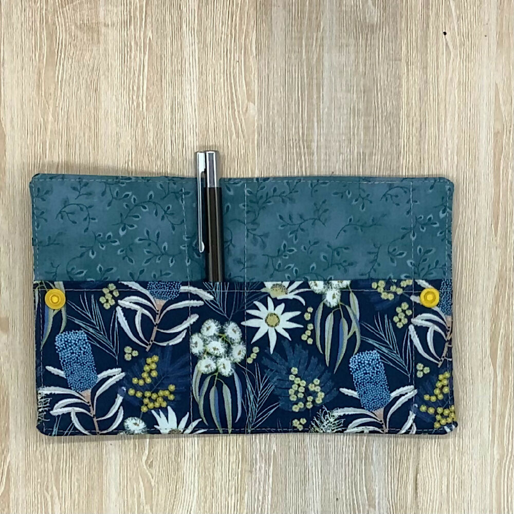 Australian Wildflowers refillable fabric pocket notepad cover with snap closure. Incl. book and pen.