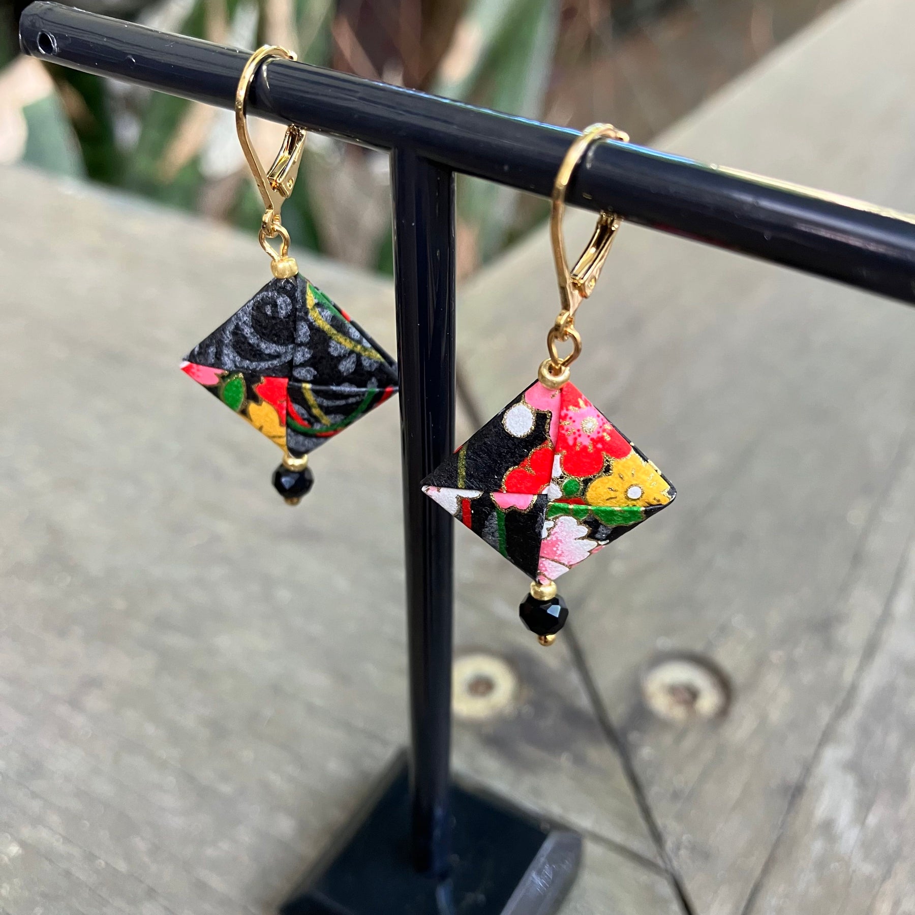 Origami Earrings – smoky black with vibrant botanicals.  Japanese Yuzen Washi
