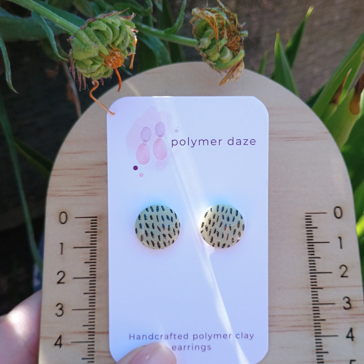 Glow in the dark painted stud earrings