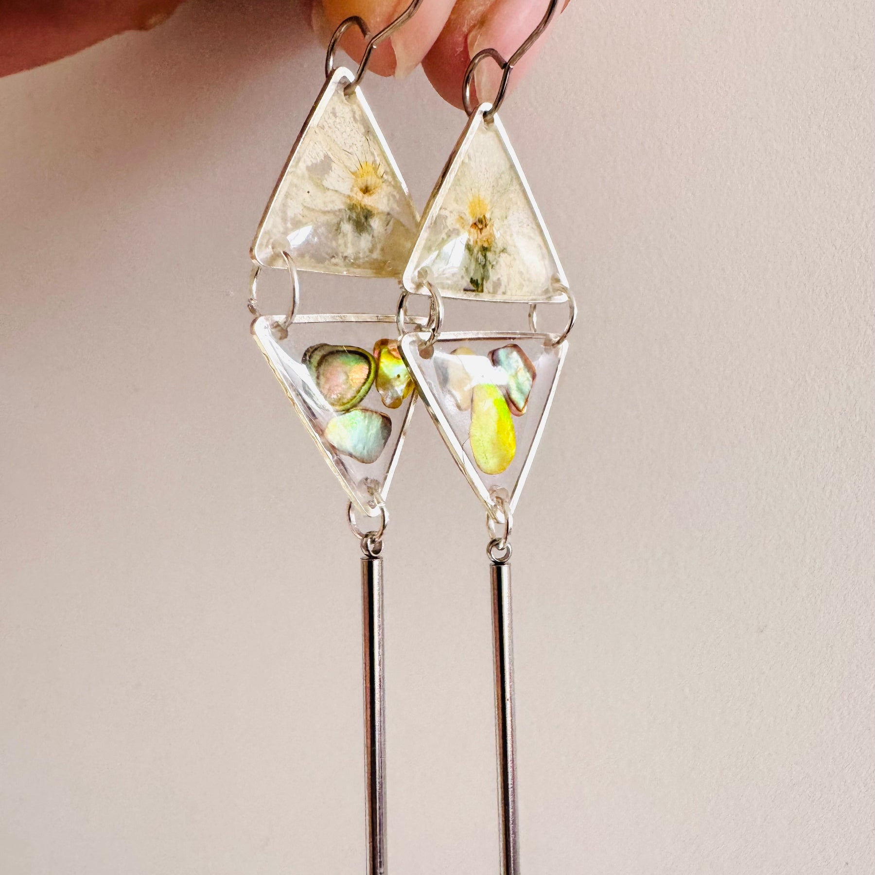 Double triangle cowrie shell and pressed flower resin earrings