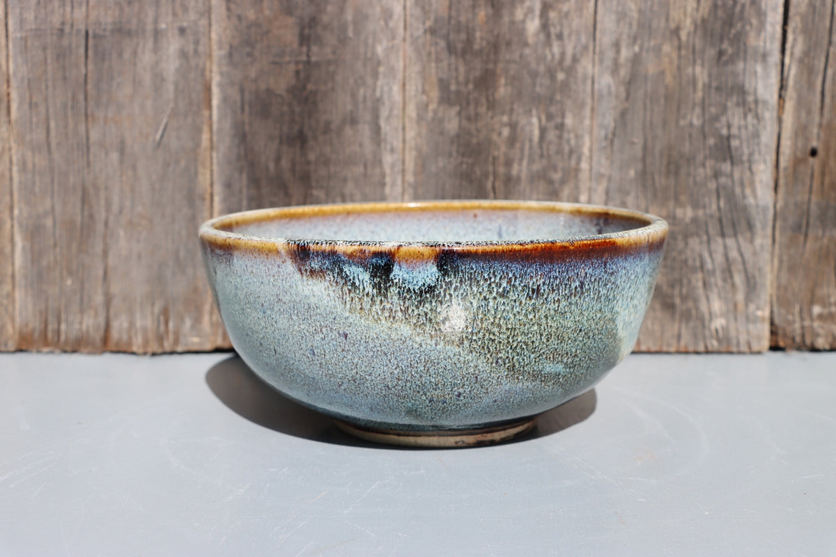 Stoneware bowls hand made with white speckled chun glaze over teadust brown.
