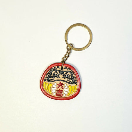 apanese Daruma leather keychain with Acrylic Hand Painting