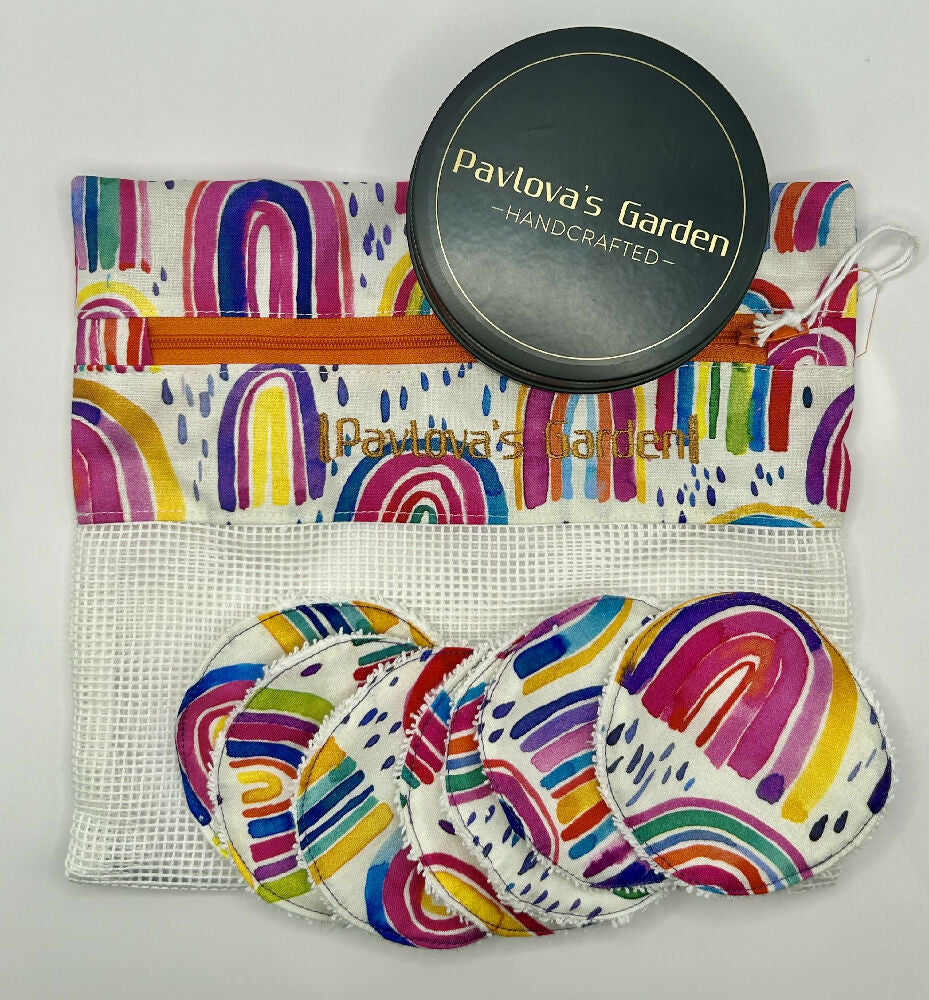 Set of reusable makeup / face scrubbies with a storage tin and matching laundry bag. rainbow fabric