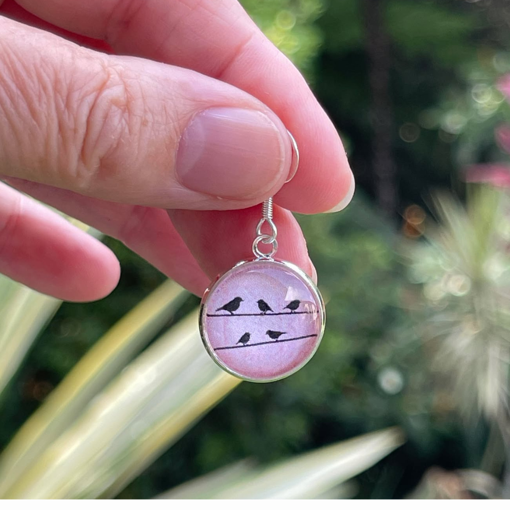 Little Bird Earrings on Pink.  Handmade with Papers and Glass