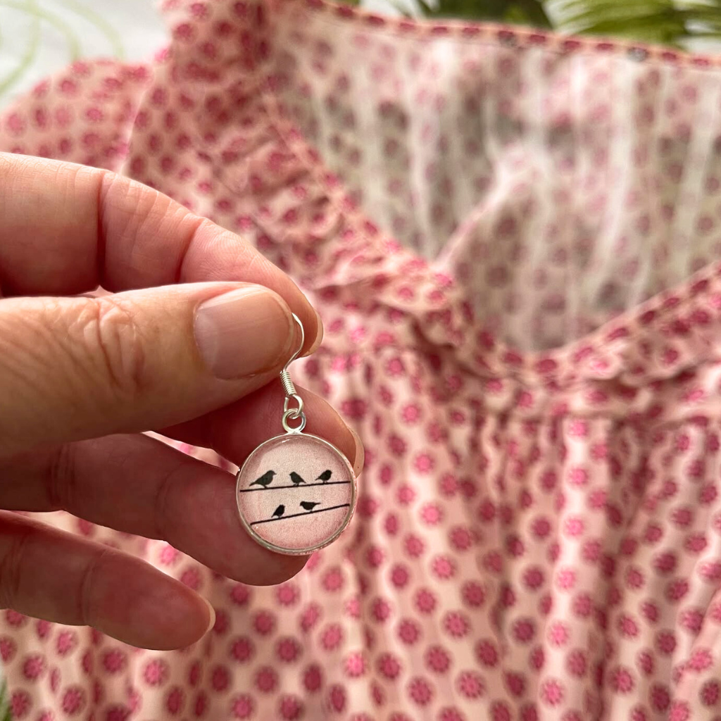 Little Bird Earrings on Pink.  Handmade with Papers and Glass