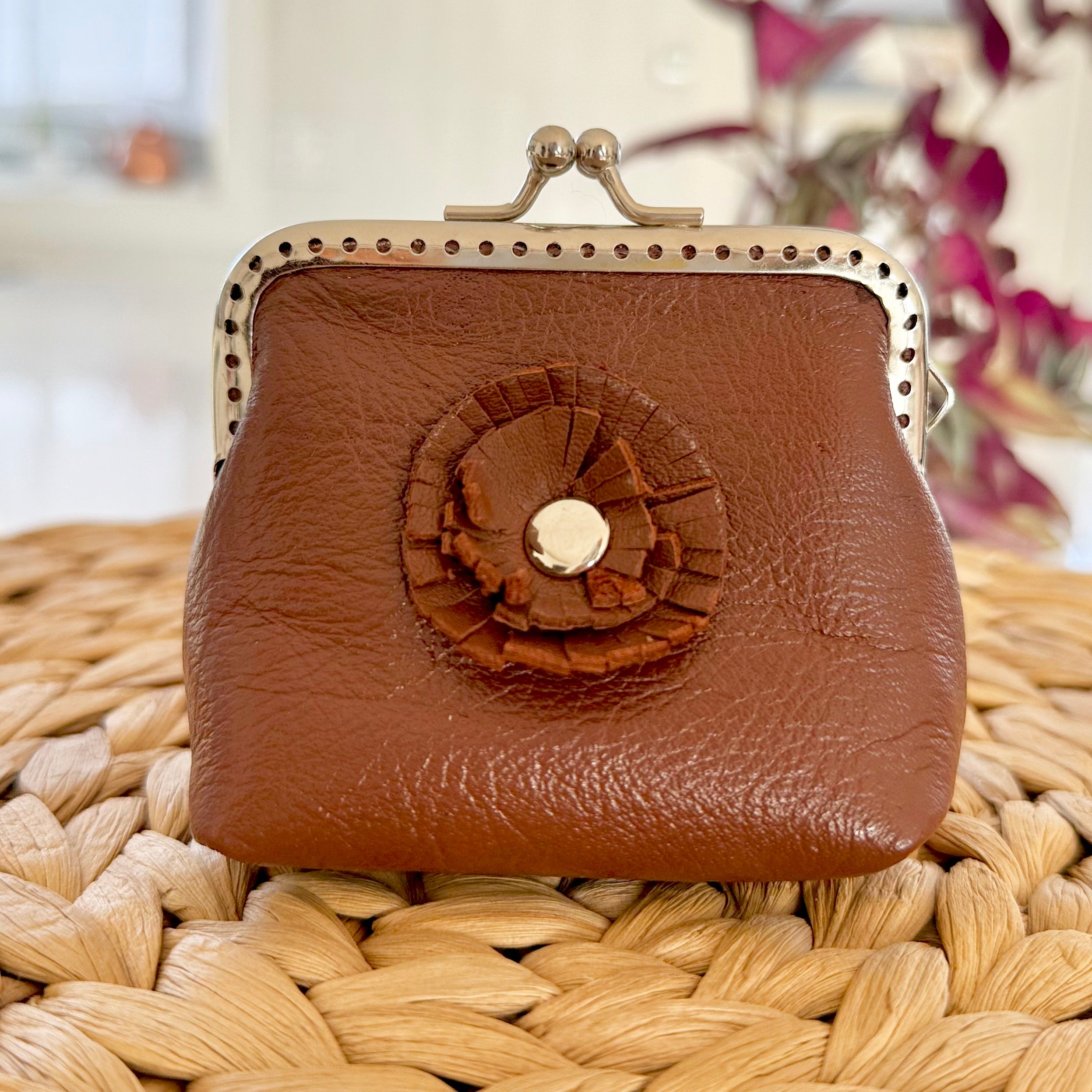 Coin purse with rosette flower accent