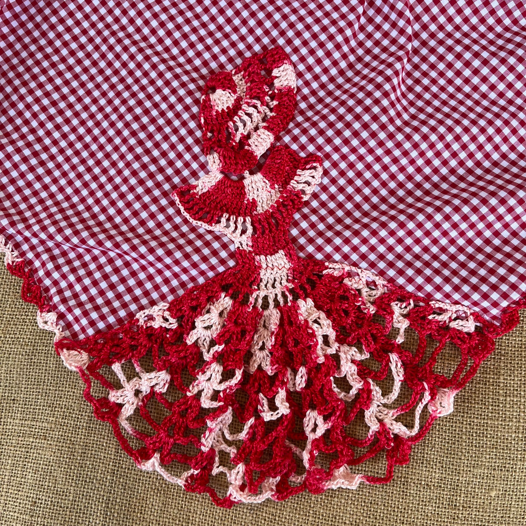 Red gingham apron with hand crochet lady