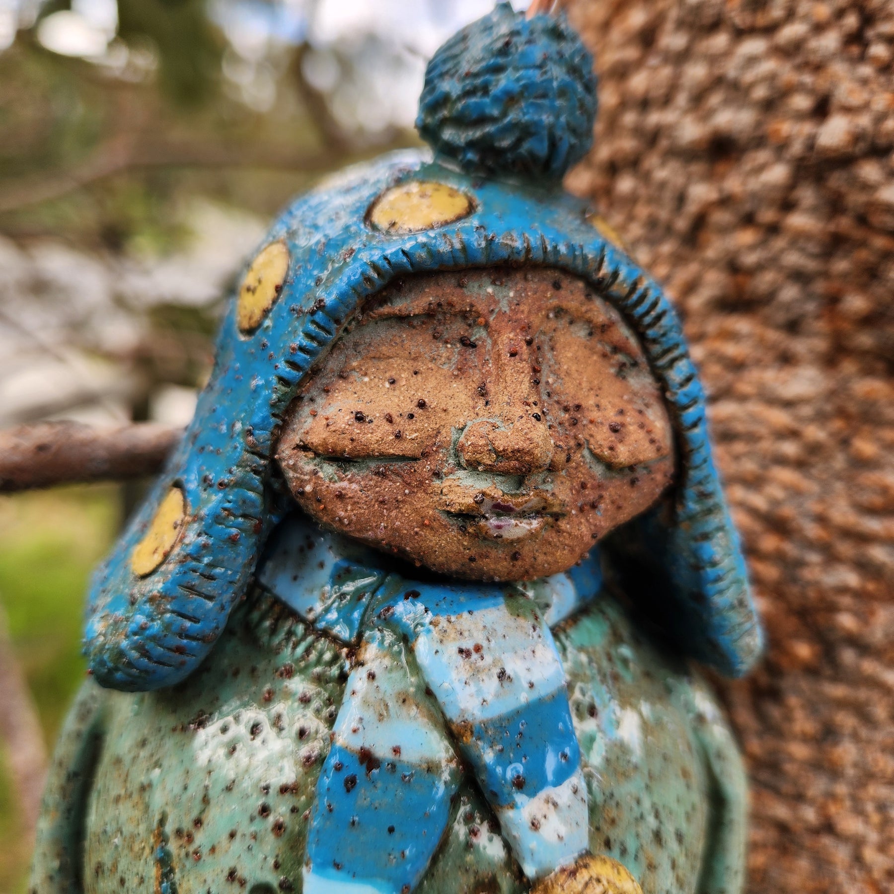 Clay windchime, little girl, bird