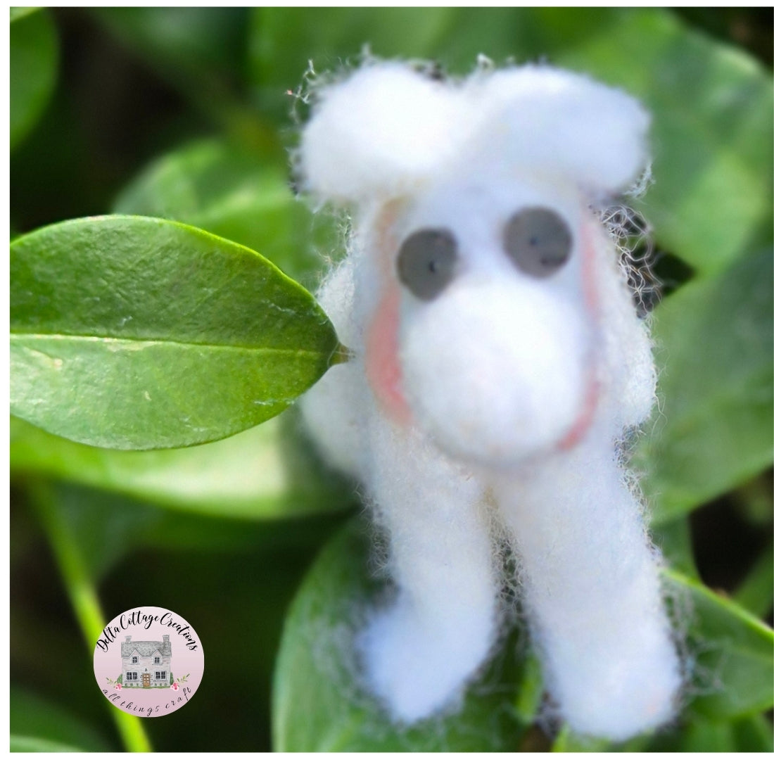 Needle Felted Dog Sitting with Pink Bow