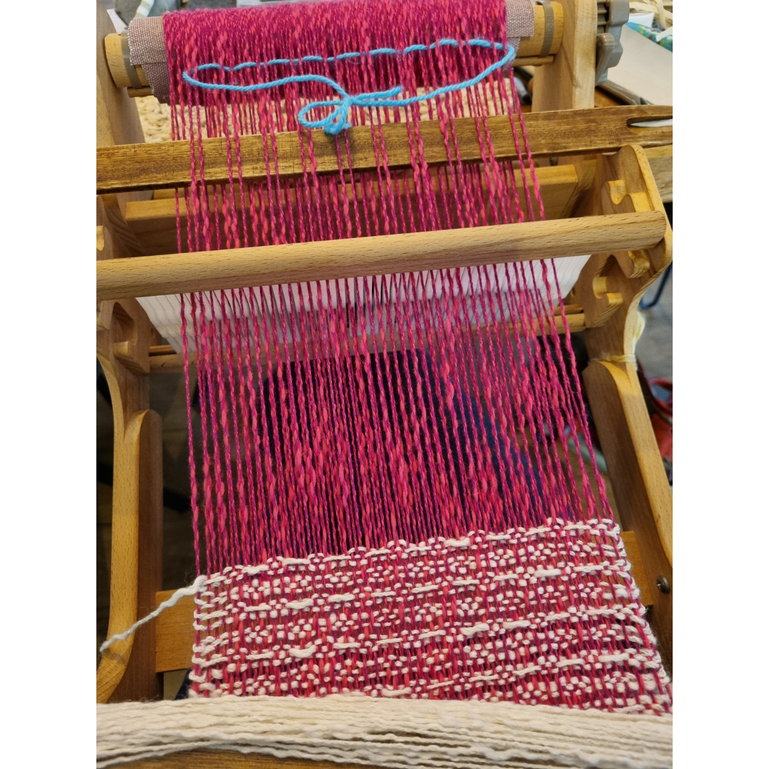 Cozy pink and white waffle-weave scarf