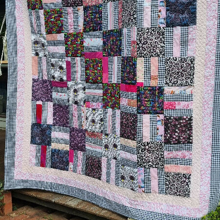 Candy pink coloured swear word quilt. Small Queen size