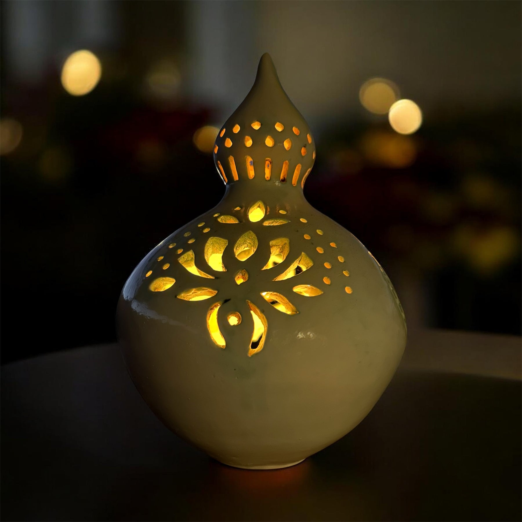 Ceramic hand carved lantern