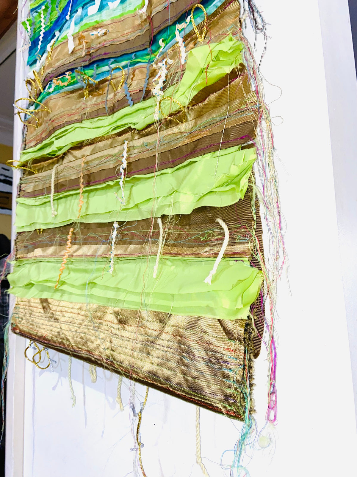 Green, Blue and Gold textile wall hanging