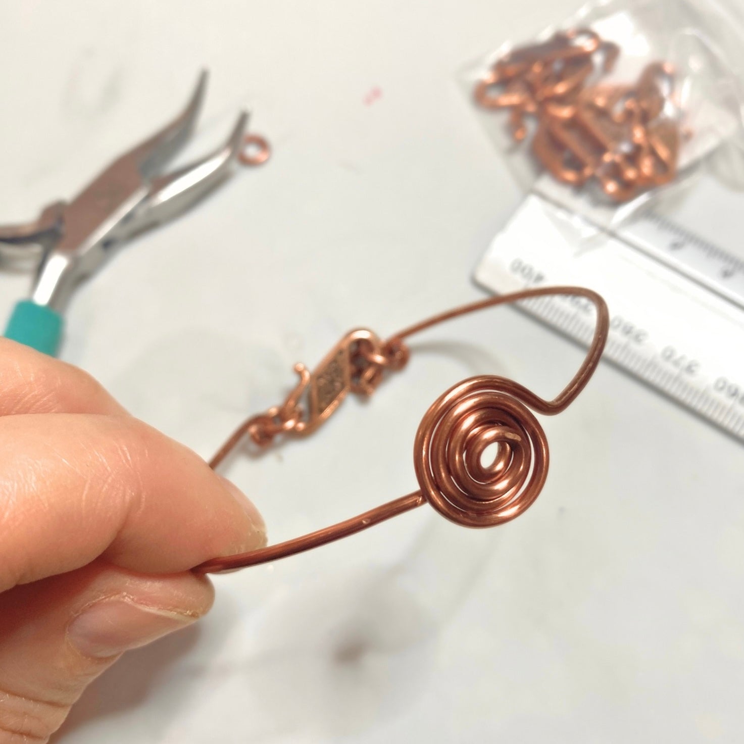 Simple antique copper spiral bracelet | Bangle with Triquetra clasp | Celtic-inspired jewellery