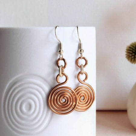 Copper and silver spiral two-tone dangle earrings