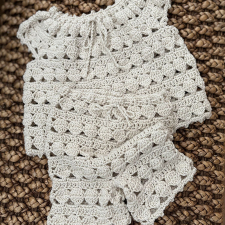 Retro style crocheted smock and matching bloomers set.